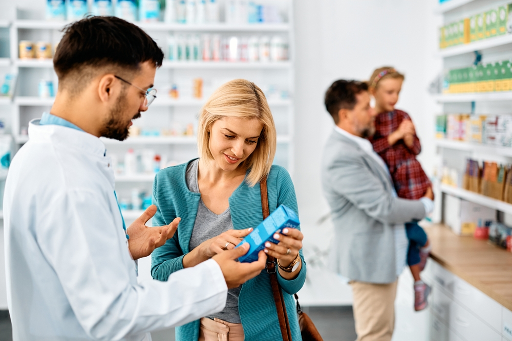 pharmacist helping a shopper